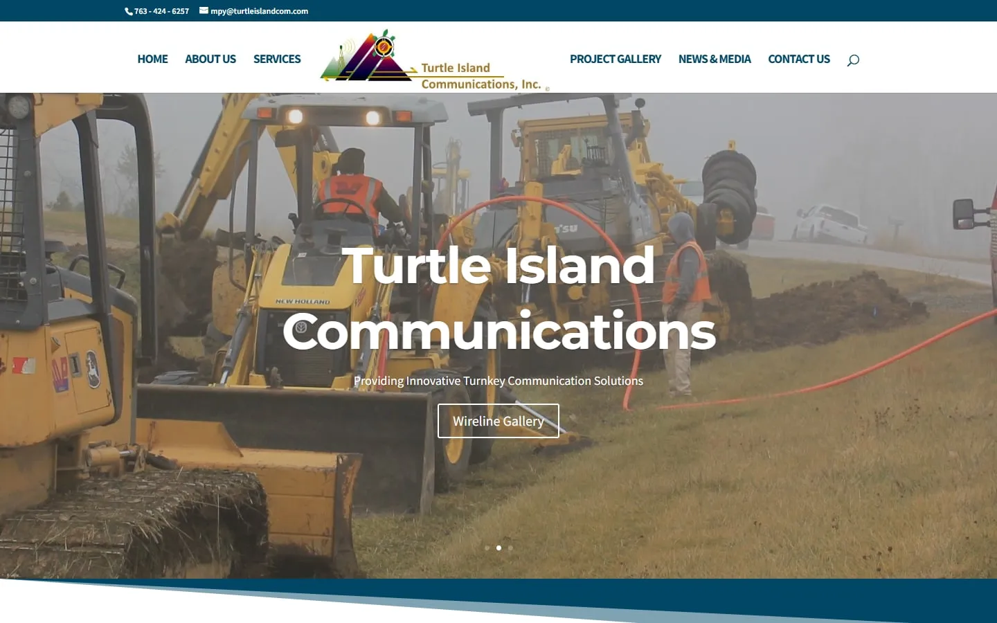 The Turtle Island Communications home page: the company name over a photo of an excavator laying cable, with a link to the wireline gallery.